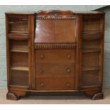 A 1940s oak side by side bureau.