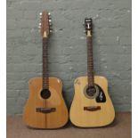 A jumbo rosewood model acoustic guitar along with a similar 12 string model both by Givson musical