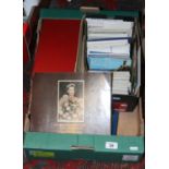 A box to include a quantity of British and foreign postcards, loose and in albums,