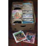 A box of 7 inch singles to include soul, pop etc.