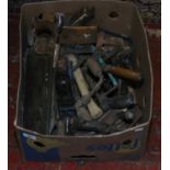 A box of vintage wood working tools, planes, hand saws,