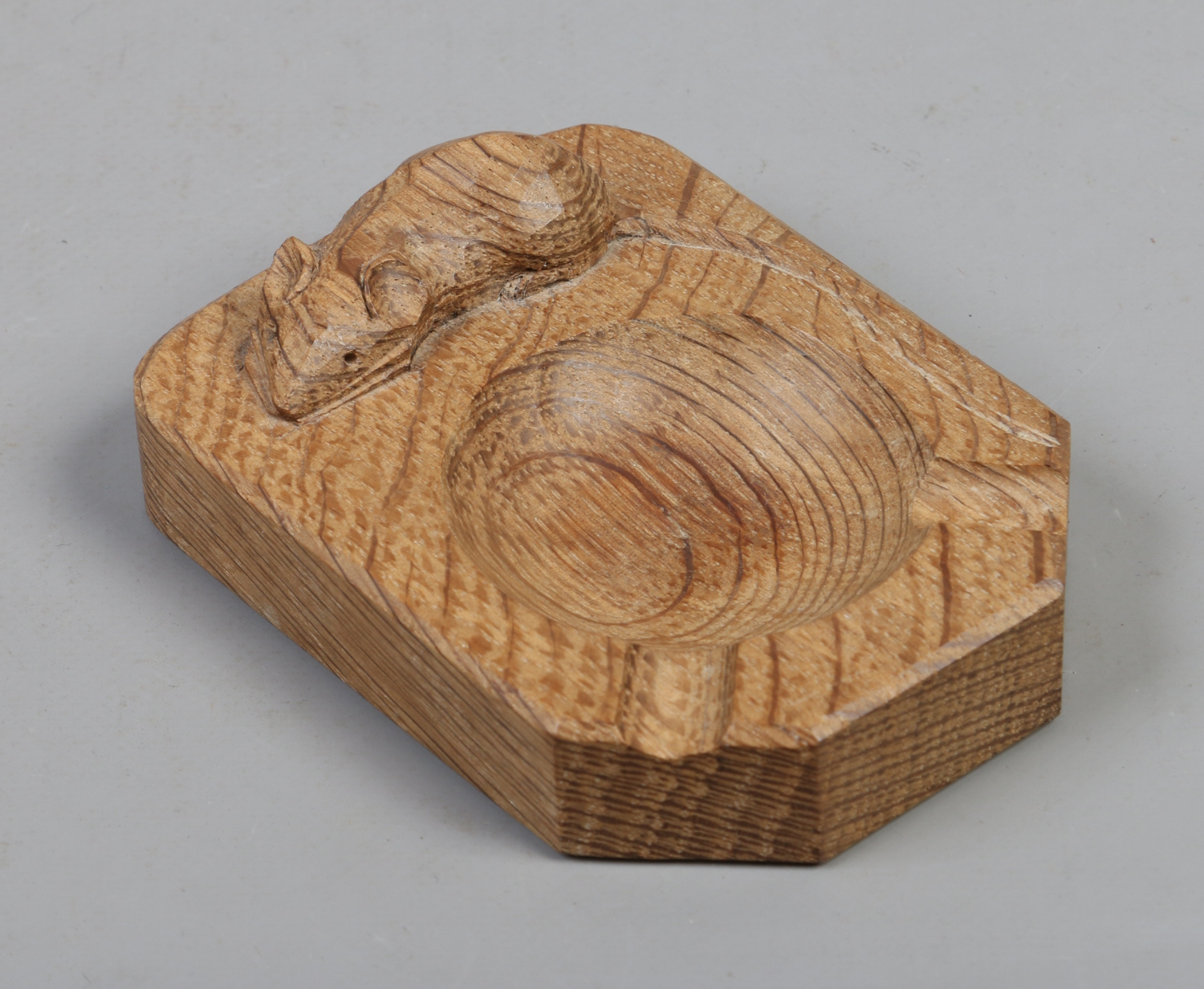 A Robert Mouseman Thompson carved oak ashtray.