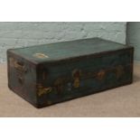 A vintage metal bound steamer trunk By Newark Trunk Company USA. locked no key.