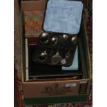 A box of cased cutlery to include spoons, fish knives etc.