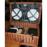 A Optima picninc basket complete set made in West Sussex England.