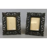 A pair of colonial carved wood picture frames.