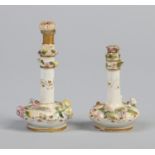 Two small Rockingham scent bottles and stoppers.
