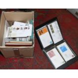 A box of stamps including British first day covers,