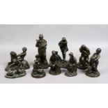 A quantity of bronzed and Spelter figures to include farming examples.