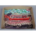 A box of costume jewellery beads, crystal and mineral etc including rose quartz.