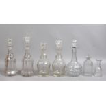 A collection of Victorian cut glass decanters.