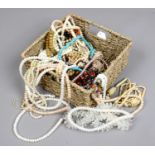 A basket of beads and necklets to include fresh water pearls.