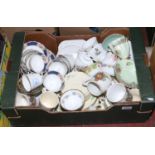 A box of mixed china and pottery including Royal Doulton, Wedgwood, Crown Devon part tea service,