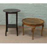 A walnut occasional table along with a two tier circular top table.