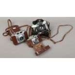 Three vintage cameras to include Balda, Agfa Karrat and Zenith.