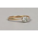 An 18ct gold solitaire diamond ring, approximately 0.5ct, size P.