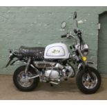 A Zherhua Monkey 125cc motorcycle UK Registered and with current MOT certificate and only covered