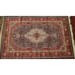 A blue ground Kashmir rug with traditional medallion design, 240 x 160cm.