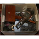 A box of miscellaneous includes a mahogany tea caddy, storm lantern,