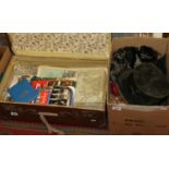 A suitcase of vintage ephemera and a box of miscellaneous includes a top hat, doll,