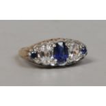 A Victorian style 9ct gold blue and white paste dress ring, size N.
