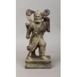 A Chinese carved wood small statue of warrior with gesso decoration.