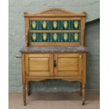 A Victorian satinwood washstand.