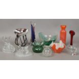 A collection of clear and coloured glasswares to include Caithness, art glass vases etc.