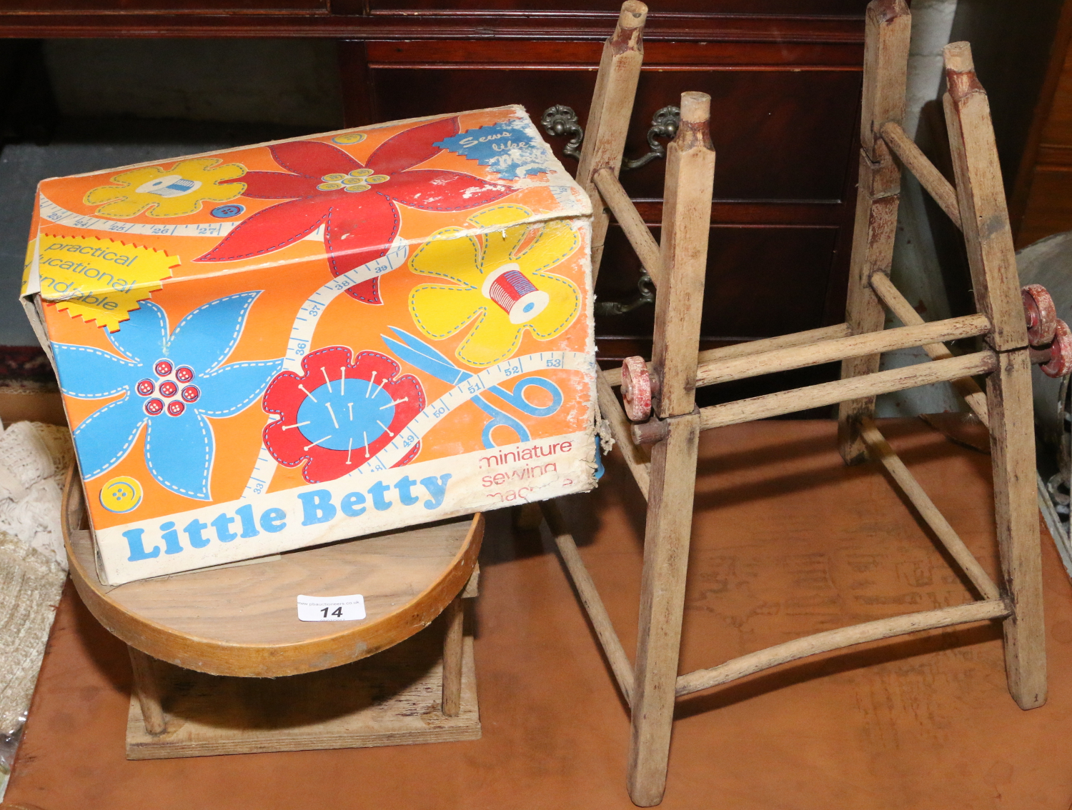 A boxed vintage 'little Betty' miniature sewing machine,