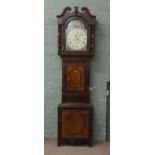 A Victorian oak and mahogany eight day longcase clock with painted arch top dial.