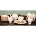 Four china part teasets including two Tuscan china pink glazed examples and Royal Albert etc.