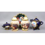 A pair of Baron china decorative fruit vases;
