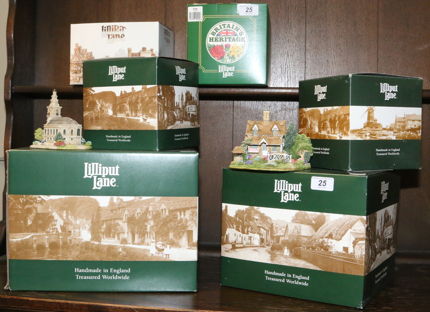 Six boxed models of buildings by Lilliput Lane including limited edition and Britains Heritage