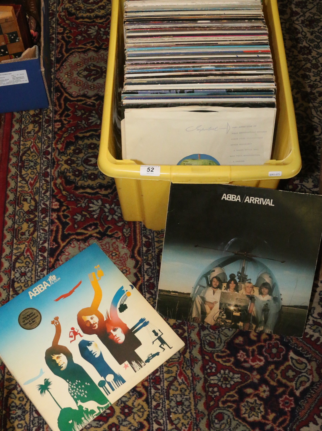 A box of L.P records to include The Beatles, Johnny Cash, Elvis etc.