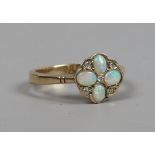 A 9ct gold opal and diamond floriform ring. Size N.