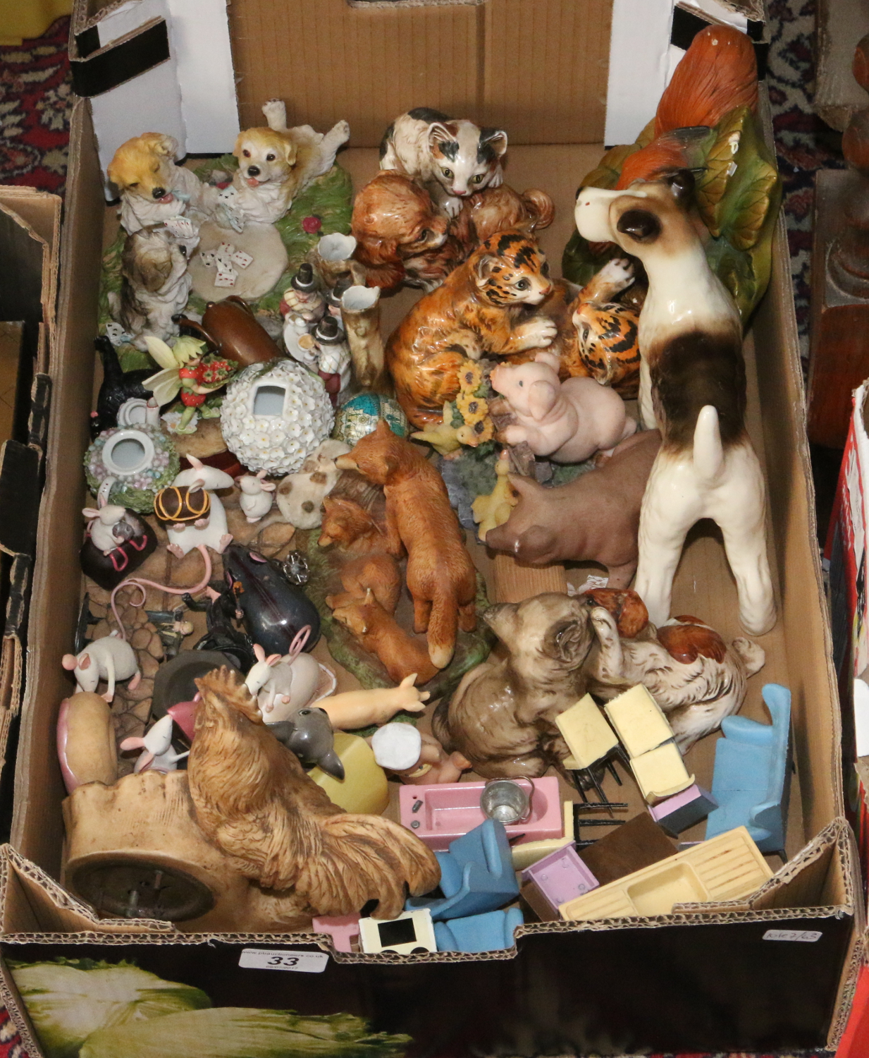 A box of mixed ornaments ceramic and composite, assorted dolls house furniture etc.