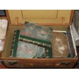 A vintage leather travel trunk containing fourteen art journals varying from 1853 to 1911.