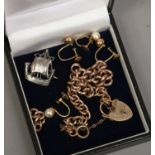 A 9ct gold bracelet (10g) two pairs of 9ct gold earrings and a silver brooch formed as a long boat