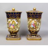 A pair of decorative porcelain lidded urns.