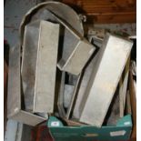 A quantity of galvanized items including chicken feeders, troughs and a bucket.