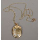 A 9ct gold locket and chain, total weight 4.2 grams.