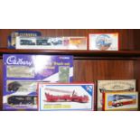 A group of boxed Diecast model vehicles including advertising examples by Lledo and Corgi.