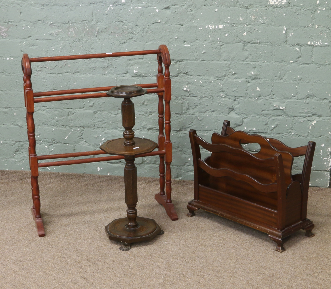 A mahogany towel rail and magazine rack along with an oak smokers stand.