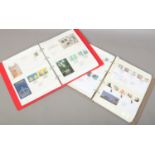 Two albums of British first day covers to include special hand stamps booklet panes and blocks.