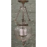 A Chrome three branch hall lantern with ribbed clear glass inverted dome shaped shade.