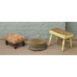 A Victorian painted pine kitchen stool, along with two upholstered foot stools.
