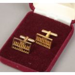 A pair of 14ct gold novelty cufflinks formed as a pair of working abacus 7.