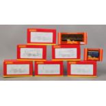 Six boxed Hornby 00 gauge 0-4-0 locomotive trains and two wagons