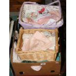 A box and two baskets of mixed lace and linen.