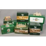 Eight boxed models of buildings by Lilliput Lane including Britains Heritage examples.